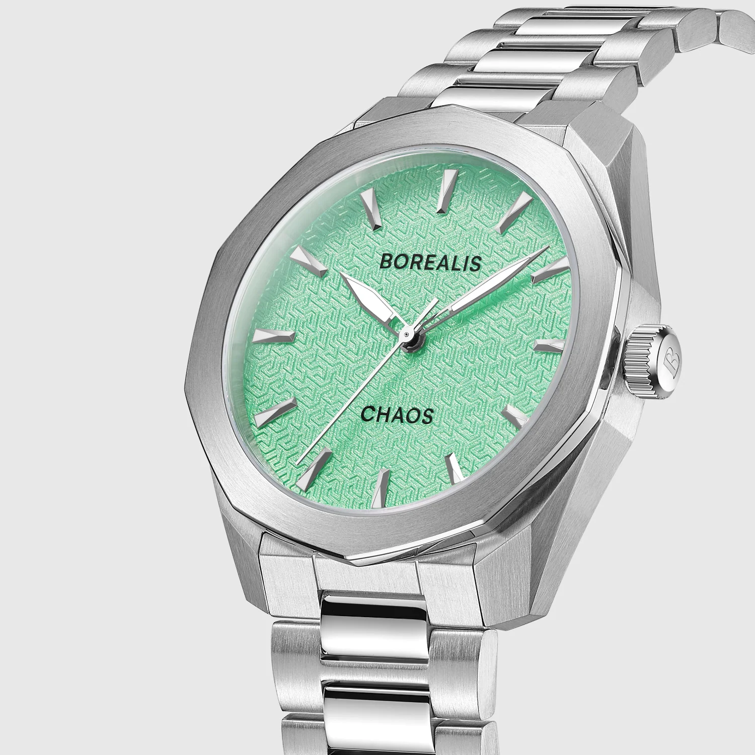 Borealis Watches Angled studio shot of a Borealis automatic dive watch featuring a clean white dial, black rotating bezel, and stainless steel bracelet against a solid white background.