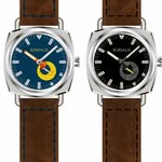 Product photo showcasing two Borealis watches with brown leather straps, featuring dark dials and distinctive graphic sub-dials.