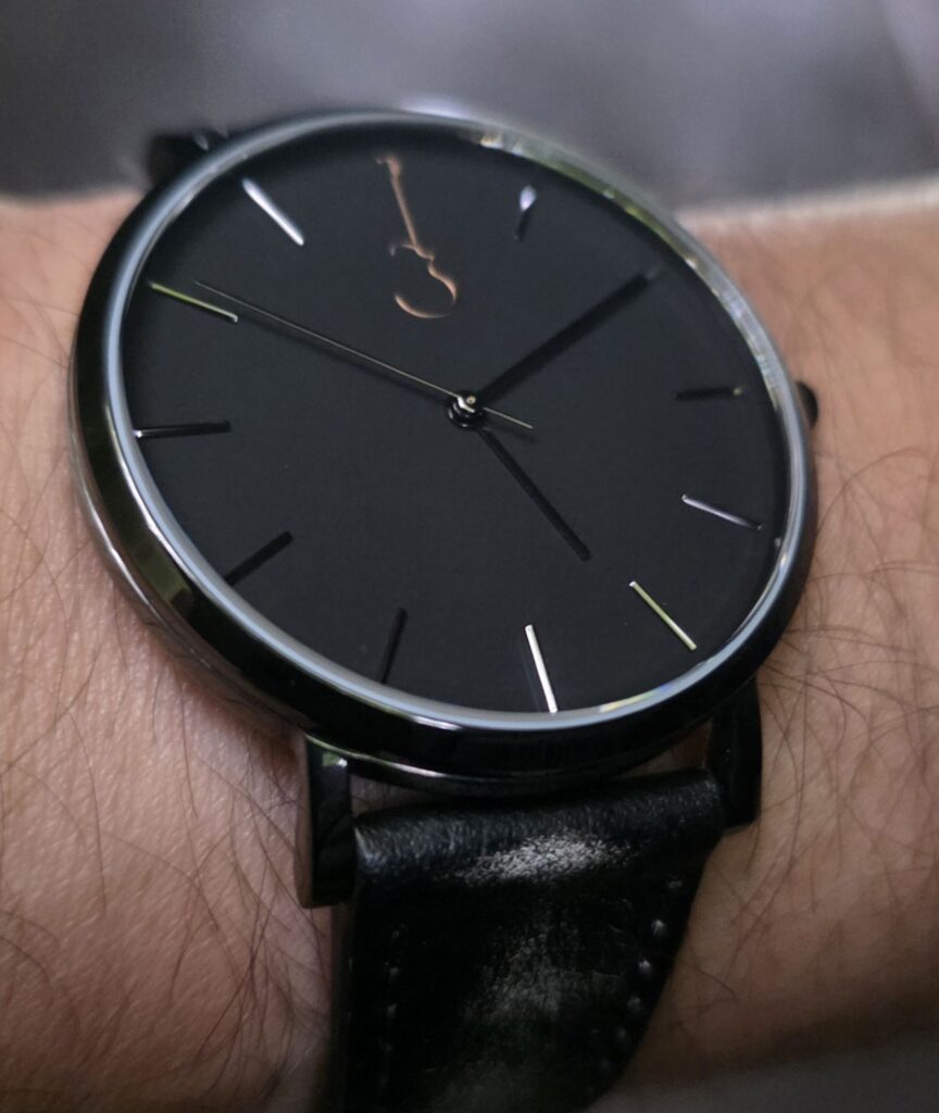 Luthier Top-down wrist shot of the 40mm Luthier LP Black watch worn on the wrist.
