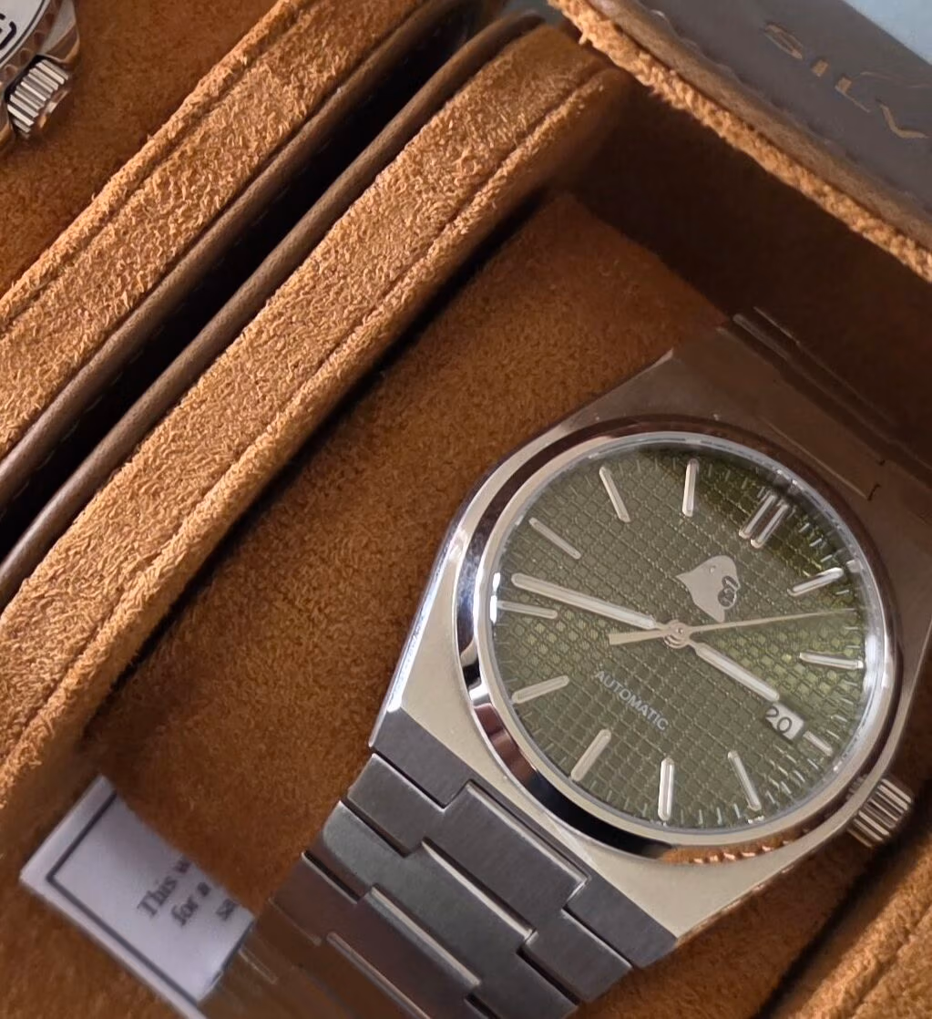 Review: Silverback Watches Interceptor Silverback Watches Interceptor with sage green dial and integrated stainless steel bracelet, shown in watch roll