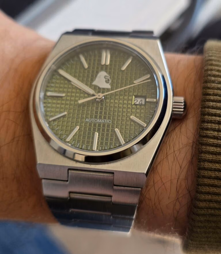 Silverback Interceptor worn on the wrist, its sage green dial and integrated steel bracelet sitting comfortably at 40mm